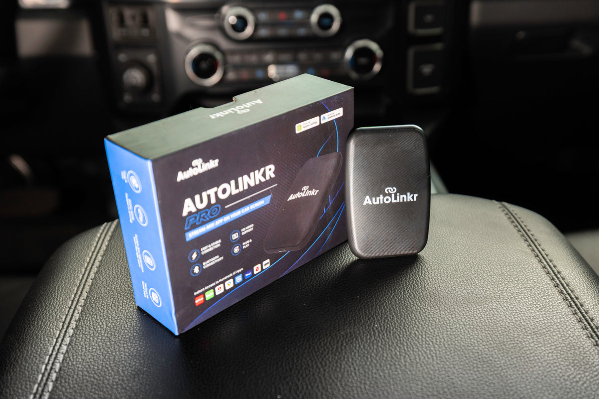 AutoLinkr product box on a car center console